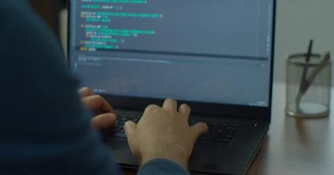 Close up hands engineers developing software app using digital laptop computer Stock Photos