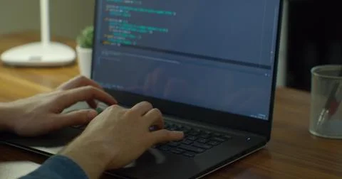 Close up hands engineers developing software app using digital laptop computer Stockfoto's