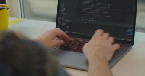 Close up hands engineers developing software app using digital laptop computer Stockfoto's