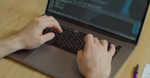 Close up hands engineers developing software app using digital laptop computer 写真素材