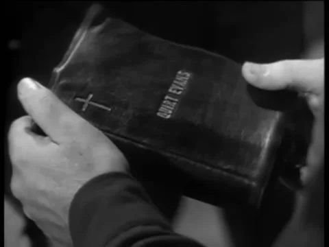 Close-up of hands exchanging a bible Video stock 260248339