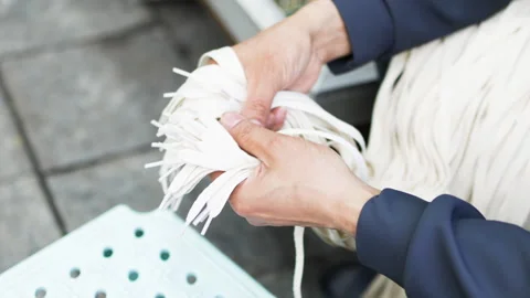 Close up of hands fingering shoelaces. Stock Footage 305370258