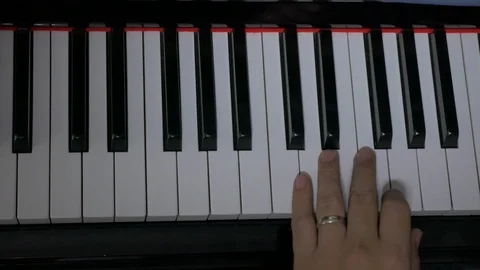 Close up hands gentle pressing keys of piano. Stock Footage 86108980