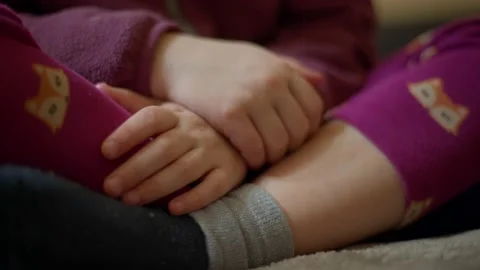 Close up of the hands of a girl who worried. Nervous little kid Stock Footage