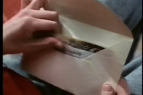 Close-up hands going through envelope full of money Stock-Footage 11346332