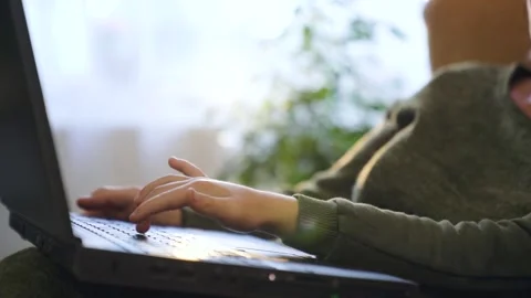 Close up hands of grandson learning to use laptop computer and typing something Stock Footage 234086979