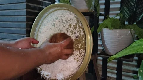 Close up of hands grating coconut Stock Footage 287243404