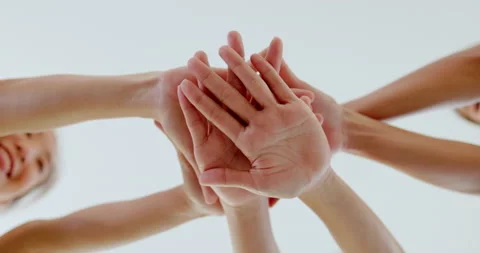 Close-up of hands of group of people brought together, unity teamwork in work. Stock Footage 172589527