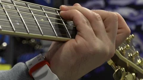 Close-up of the hands on the guitar neck Stock Footage 219841539
