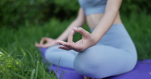 Close-up of hands, gyan mudra and lotus position. in garden outdoors  스톡 동영상 201503532