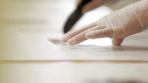 Close up of hands hands ink printing in an art class Stock Footage 296845992