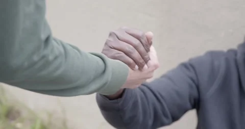 Close up hands helping friend up showing empathy and human support Stock-Footage 333198150
