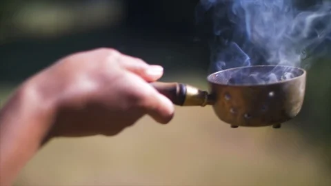 Close up, hands hold incense and walk. Stock Footage 90487014
