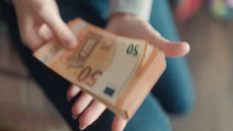 Close Up Hands Holding Large Stack Of Fifty Euro Banknotes Indoors Stock Footage 333995164