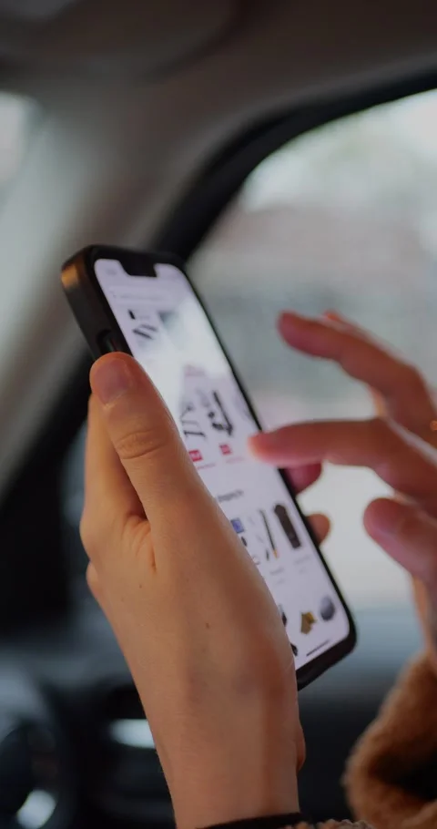 Close-up of hands holding a smartphone in vertical orientation... Stock Footage 319883418