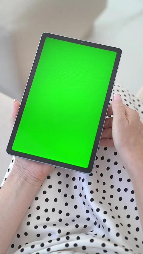 Close-Up of Hands Holding Tablet with Green Screen, Touching Interactive Display Stock Footage 302291011