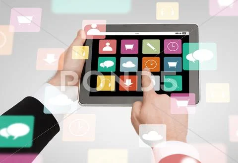Close up of hands holding tablet pc with app icons Stock Photos