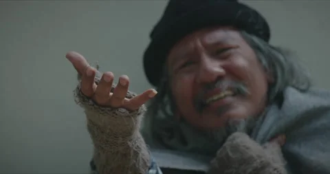 Close up hands of homeless man is begging for money and help Stock Footage 139848155