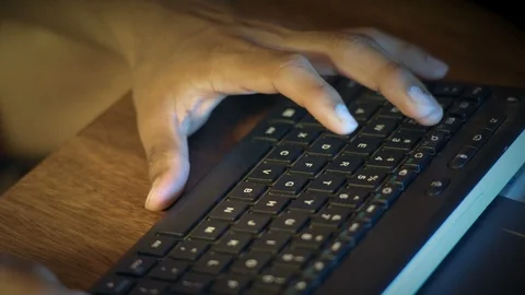 Close-up, Hands of an Indian Guy Dial Text On The Computer Keyboard Stock Footage 90867985