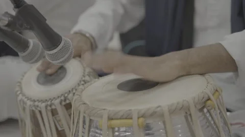 Close-up of hands of an Indian man playing a paired tabla drum Stock Footage 316301733
