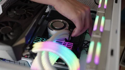 Close-up of hands installing components and customizing desktop computer system Stock Footage 318013488