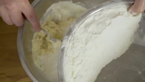 Close - up hands knead the dough on the table at home. Close-up of a woman with Stock Footage 140060047