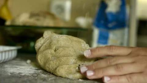 Close-Up of Hands Kneading Dough in Kitchen Stock-Footage 315584645