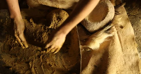 Close-up of hands kneading the mud Видео 61268377