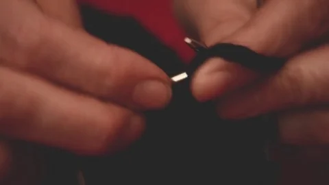 Close-up hands with knitting needles, beautiful woman knits Stock Footage 84841295