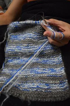 Close Up of Hands Knitting Warm Wool Sweater Stock Photos
