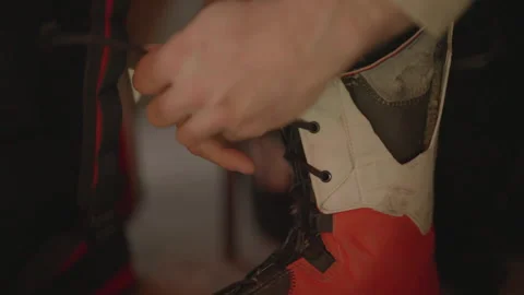 Close-up of hands lacing ski boot Video stock 346055998