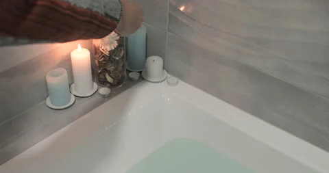 Close Up hands lighting candles at the Bathroom 스톡 동영상 142486218