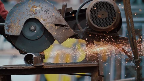 Close-up of hands lndustrial worker grinding metal with a lot of sharp. Sparks Stock Footage 129674014