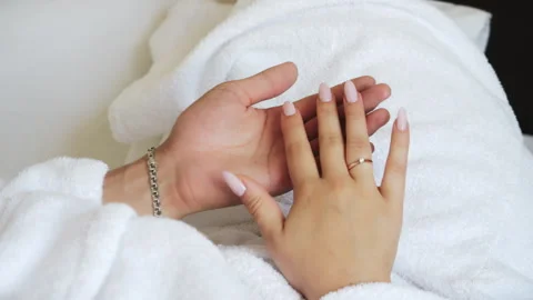 Close-up of the hands of a loving couple, man and woman. Stock Footage 295334994