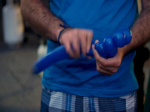 Close up hands making balloon animals. Stock-Footage 76769234