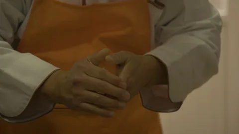 Close-Up of Hands Making Dumplings in Beijing Street Food Kitchen Stock Footage 345880775