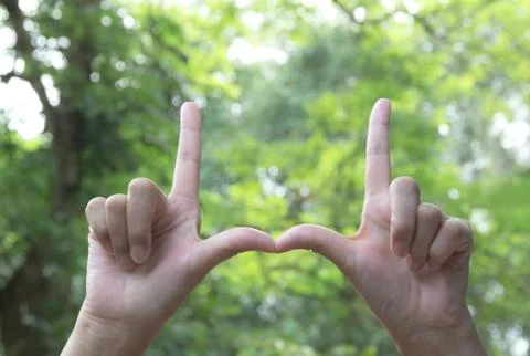 Close up of hands making frame gesture. Close up of woman hands making frame  Foto stock