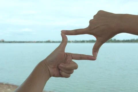 Close up of hands making frame gesture. Close up of woman hands making frame  Stock Photos