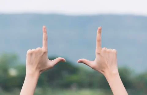 Close up of hands making frame gesture. Close up of woman hands making frame  Stock Photos