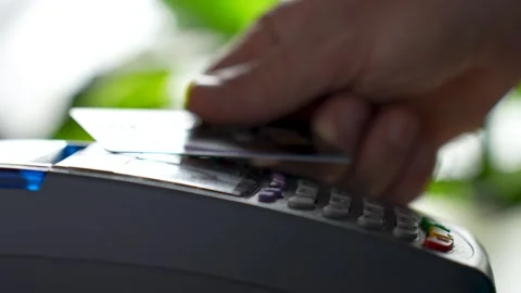 Close up hands making payment with credit card and pos terminal Stock Footage 254339711