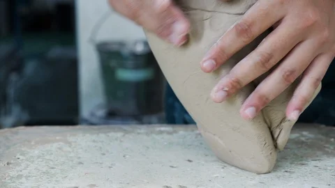 Close up of hands making pottery in indoor workshop, Melaka, Malaysia Stock Footage 146562898