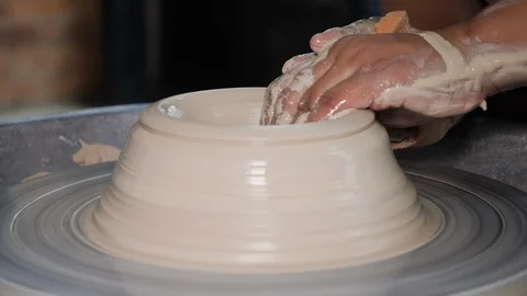 Close up of hands making pottery in indoor workshop, Melaka, Malaysia Stock Footage 146565678