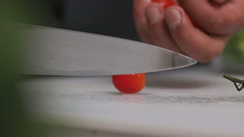Close up hands man cutting red cherry tomato sliced table vegetarian chef hand Stock Footage 103291227