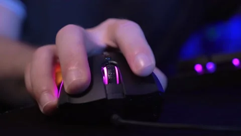 Close-up on the Hands of the man gamer playing in the keyboard computer Stock Footage 149042976