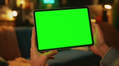 Close up hands man holding and tapping on a tablet computer with a horizontal Stock Footage 238744524