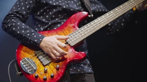 Close-up of hands of man playing an electric guitar. Guitar solo. Slow motion Video stock 243766009