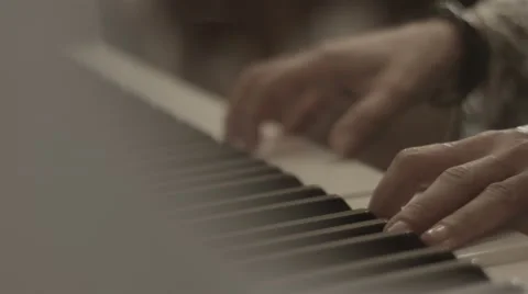 Close up hands of a man playing piano Stock Footage 62618293