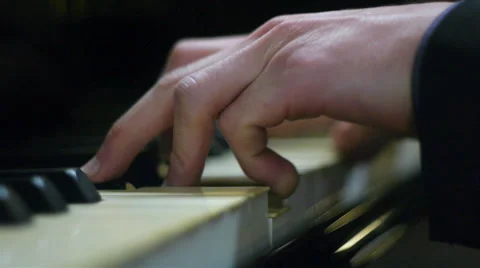 Close up hands of a man playing piano. Video stock 63068380