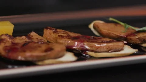 Close up hands man shot of flip rib eye steak with herbs on grill pan smoke Stock Footage 103286519