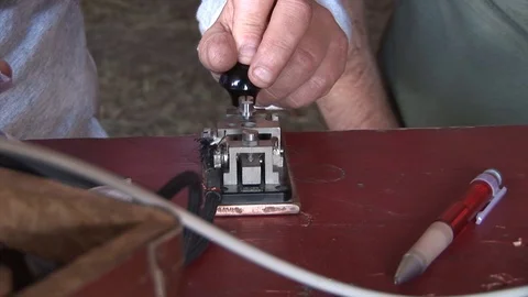 Close up of hands man using Morse Code Stockbeeldmateriaal 108783101